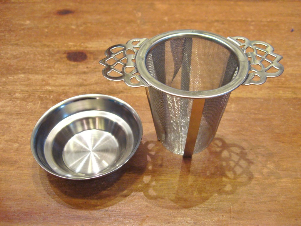 Filtre permanent en inox et son support - en aparthé