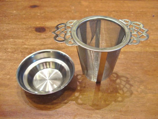 Filtre permanent en inox et son support - en aparthé
